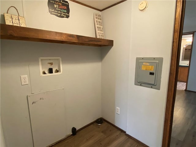 68443 S River Rd, Kentwood, LA 70444 - clothes washing area featuring crown molding, dark hardwood / wood-style floors, and hookup for a washing machine