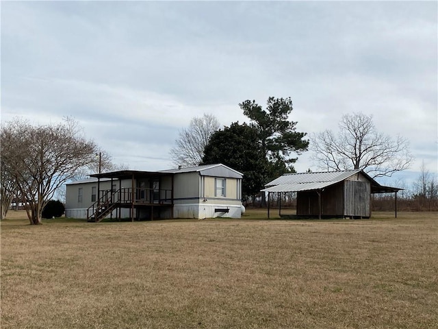 68443 S River Rd, Kentwood, LA 70444 - view of yard with a carport