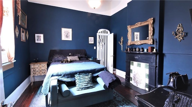 53032 Esplanade Ave, New Orleans, LA 70116 - bedroom featuring wood finished floors and baseboards