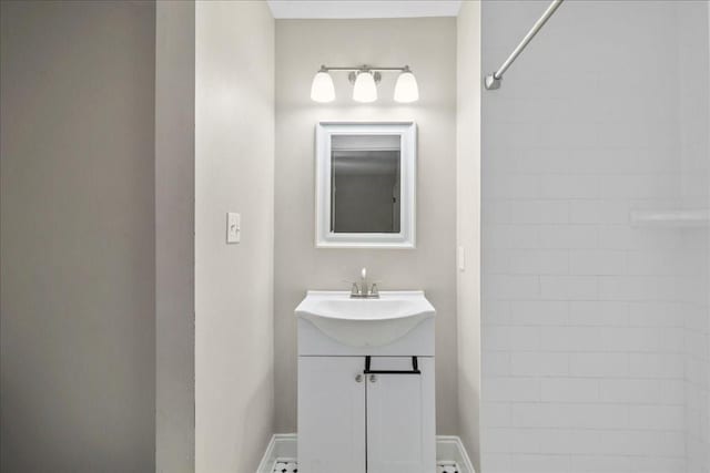 bathroom featuring vanity and a shower