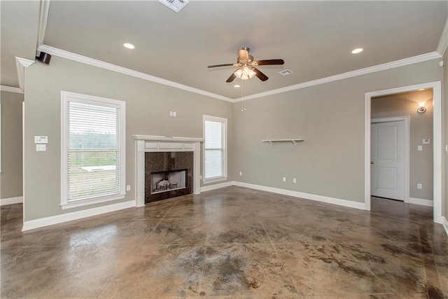 unfurnished living room with ceiling fan, ornamental molding, and a tile fireplace