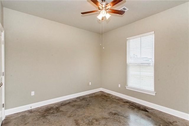 unfurnished room featuring concrete flooring and ceiling fan