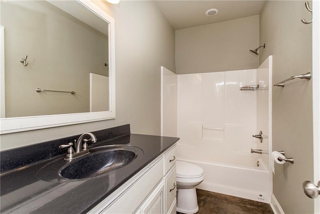 full bathroom featuring shower / tub combination, vanity, and toilet