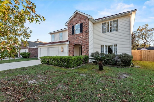 front of property featuring a garage and a front yard