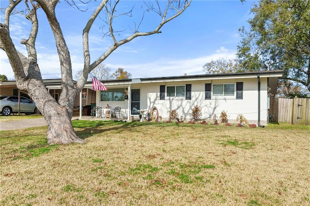 ranch-style house with a front yard