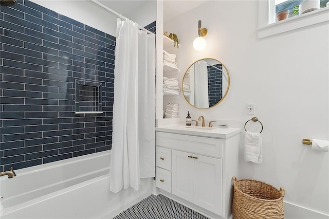 bathroom featuring tile patterned flooring, vanity, and shower / tub combo