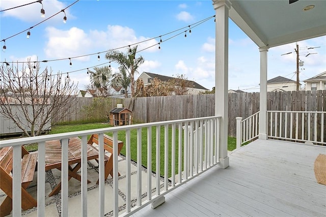 deck featuring a lawn