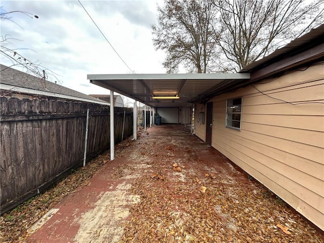 204 Magnolia Ave, La Place, LA 70068 - view of patio with a carport