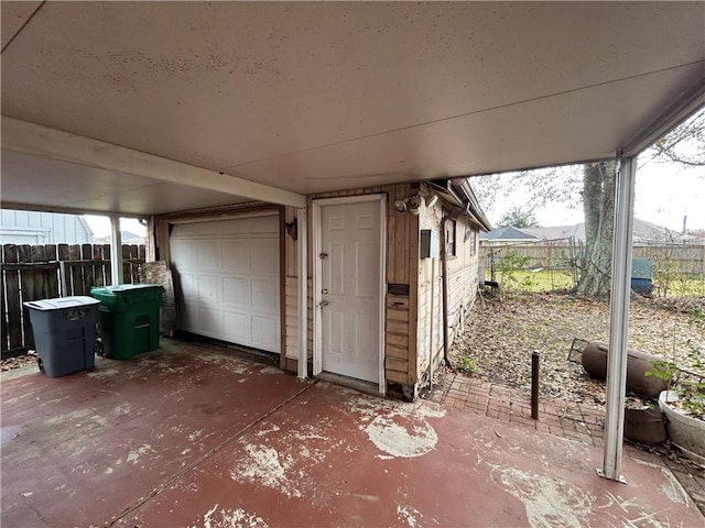 204 Magnolia Ave, La Place, LA 70068 - view of patio featuring a garage