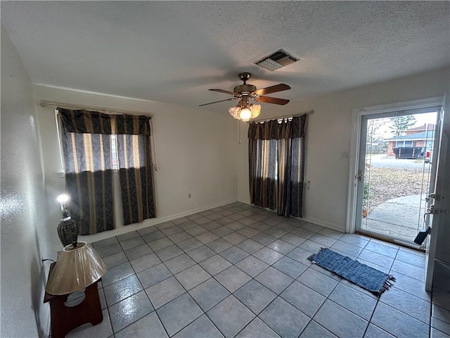 204 Magnolia Ave, La Place, LA 70068 - interior space featuring ceiling fan and a textured ceiling