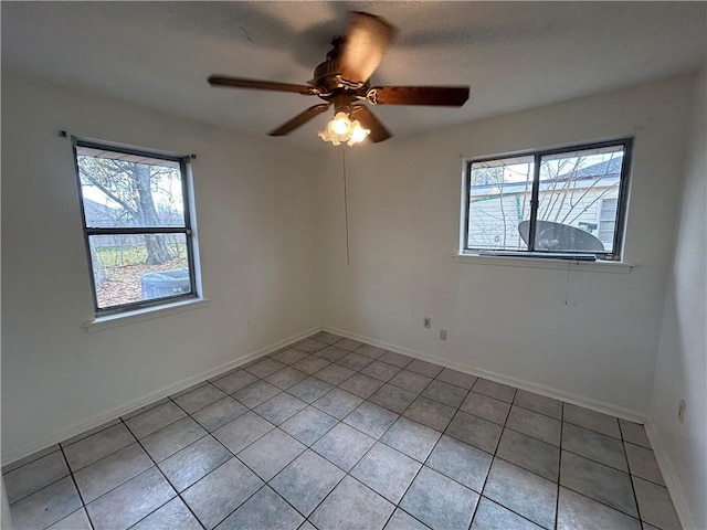 204 Magnolia Ave, La Place, LA 70068 - unfurnished room featuring ceiling fan, plenty of natural light, and light tile patterned floors