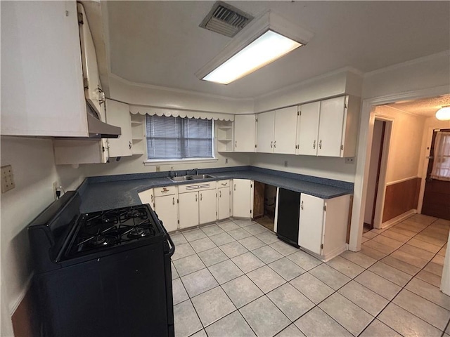 204 Magnolia Ave, La Place, LA 70068 - kitchen featuring light tile patterned floors, black range with gas stovetop, sink, and white cabinets