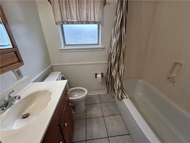 204 Magnolia Ave, La Place, LA 70068 - full bathroom featuring tile patterned flooring, vanity, shower / bath combo, and toilet