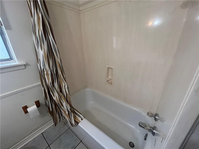 204 Magnolia Ave, La Place, LA 70068 - bathroom with shower / tub combo with curtain and tile patterned flooring