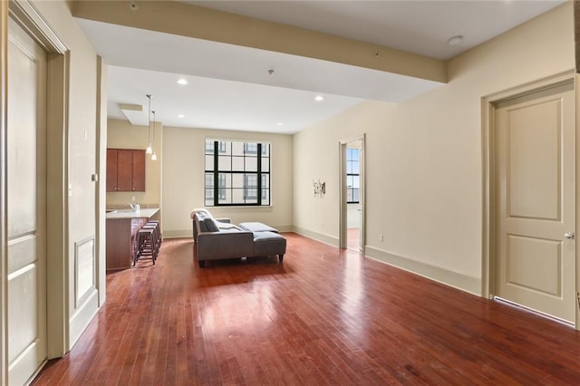 bedroom with dark hardwood / wood-style flooring