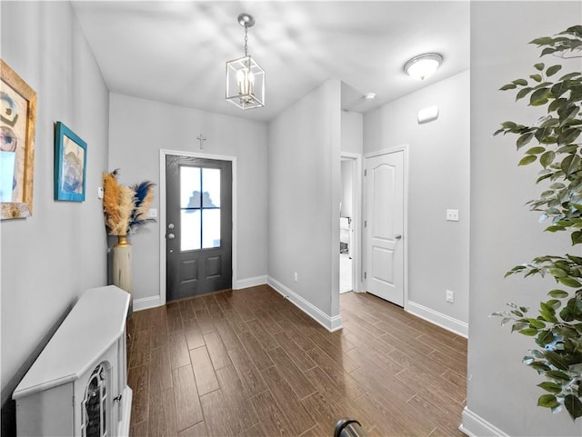 entrance foyer with dark hardwood / wood-style floors