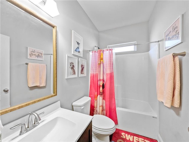 full bathroom with shower / bathtub combination with curtain, vanity, and toilet