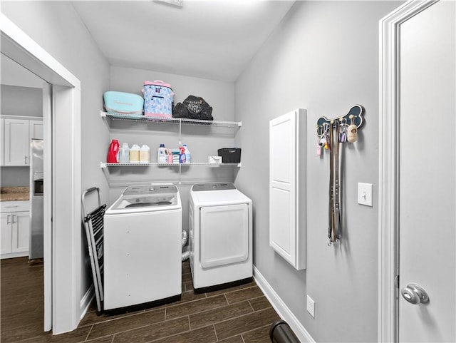 laundry room with cabinets and independent washer and dryer