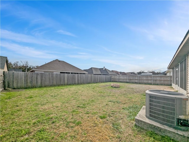 view of yard featuring central AC unit