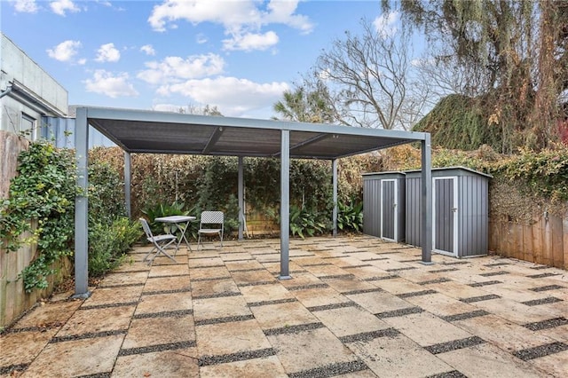 view of patio / terrace with a storage unit