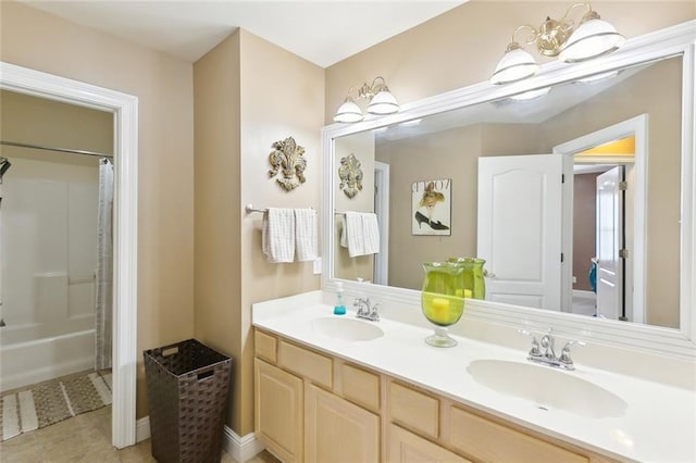 bathroom featuring vanity and shower / bathtub combination with curtain