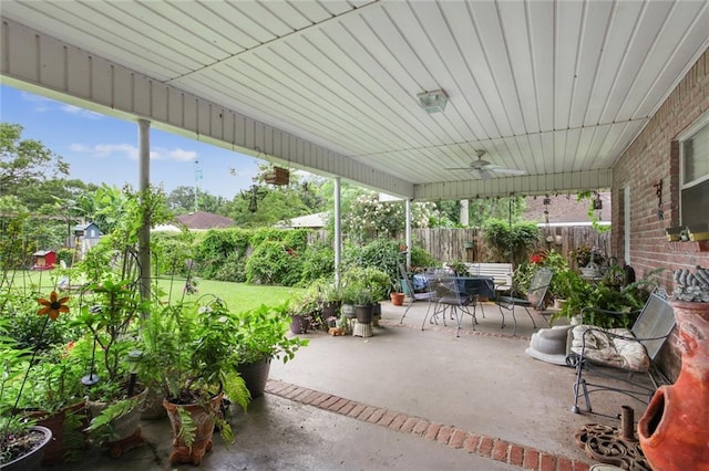 330 Saint Nicholas St, Luling, LA 70070 - view of patio with outdoor dining space, fence, and ceiling fan