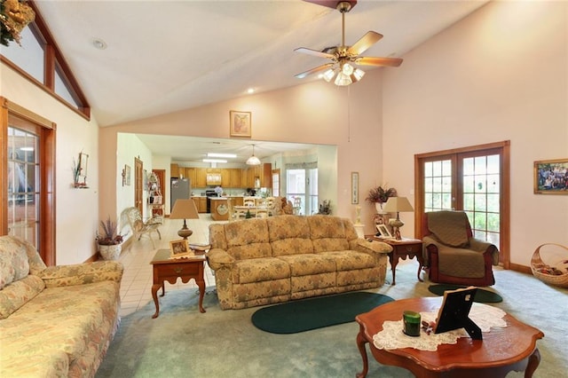 330 Saint Nicholas St, Luling, LA 70070 - living room with high vaulted ceiling, french doors, light colored carpet, and a ceiling fan