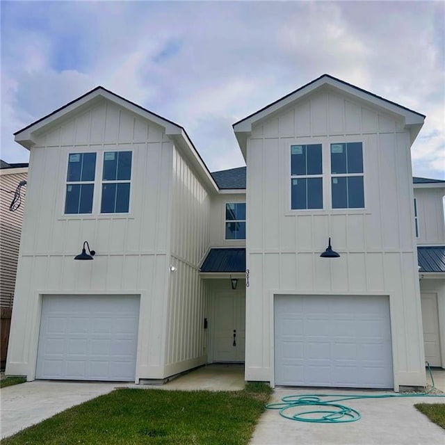 view of front of property with a garage