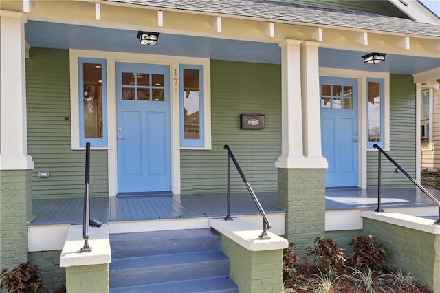 property entrance with a porch