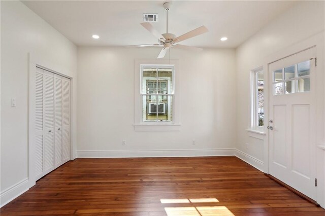 entrance foyer with wood-type flooring, french doors, and ceiling fan