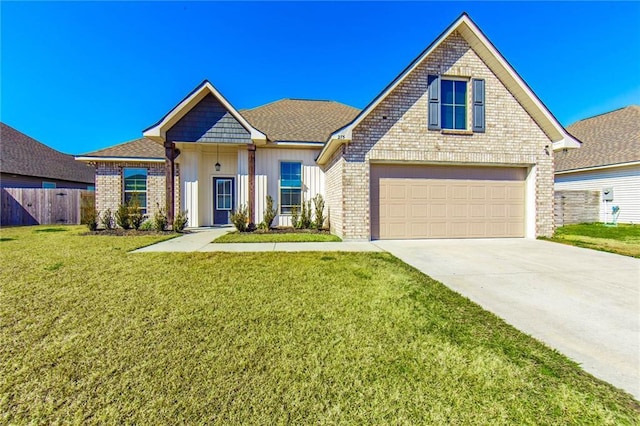 view of front of home with a garage and a front yard