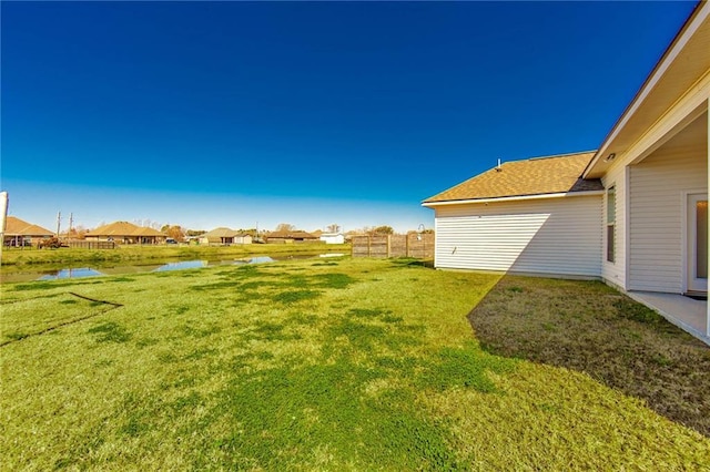 view of yard with a water view