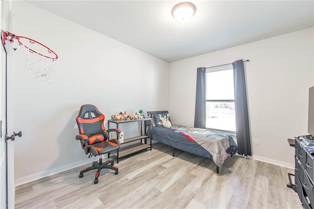 bedroom featuring light hardwood / wood-style floors