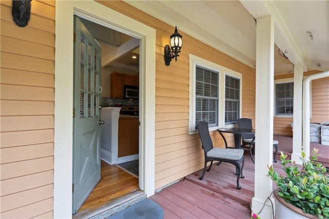 wooden terrace with covered porch