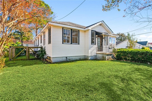 view of front of home with a front yard