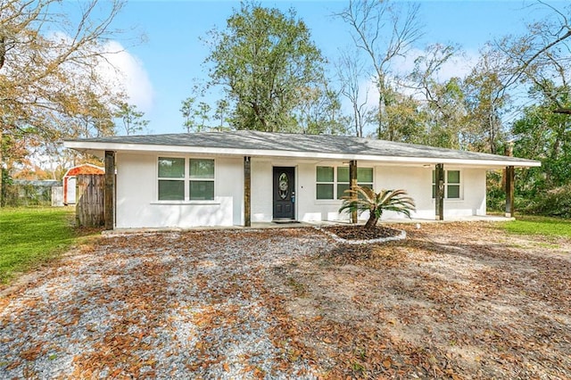 ranch-style home with a porch