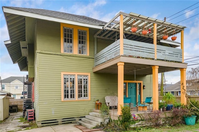 rear view of house with a patio area