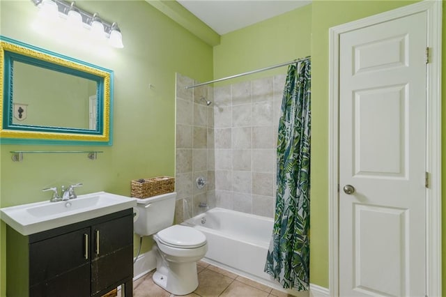 full bathroom featuring shower / tub combo, vanity, tile patterned floors, and toilet