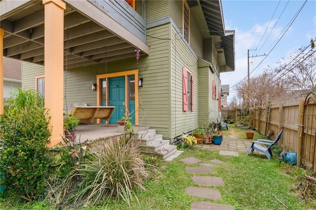 doorway to property with a patio