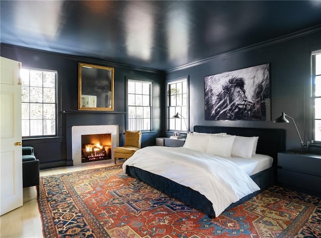 bedroom with ornamental molding