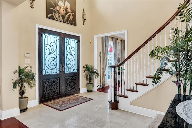 entryway featuring french doors