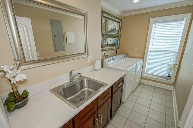 washroom with sink, crown molding, cabinets, separate washer and dryer, and electric panel