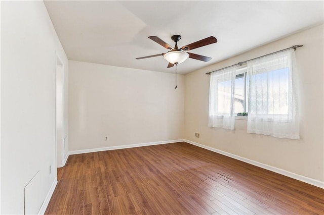 unfurnished room featuring hardwood / wood-style flooring and ceiling fan