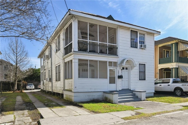 view of front of home with cooling unit