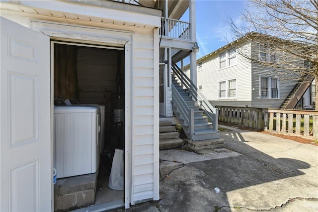 exterior space with washer and clothes dryer