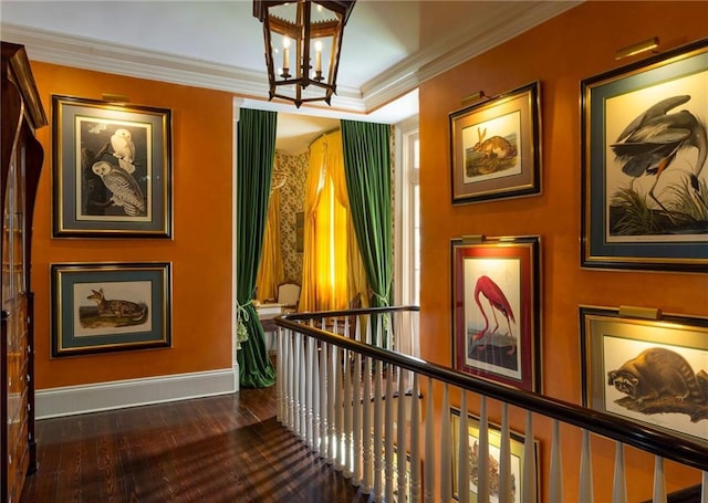 2425 Coliseum St, New Orleans, LA 70130 - corridor featuring a notable chandelier, baseboards, an upstairs landing, crown molding, and dark wood-type flooring