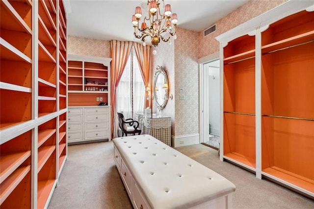 2425 Coliseum St, New Orleans, LA 70130 - spacious closet with a chandelier, carpet, and visible vents
