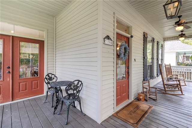 deck featuring ceiling fan and covered porch