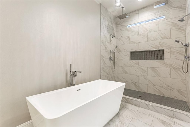 bathroom with separate shower and tub