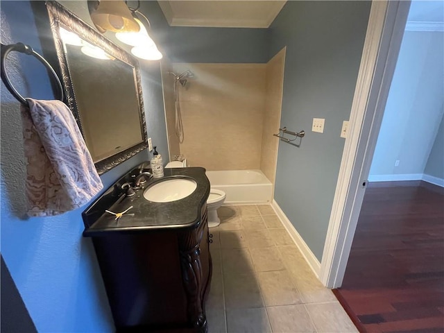 full bathroom featuring crown molding, tile patterned floors, vanity, and shower / washtub combination